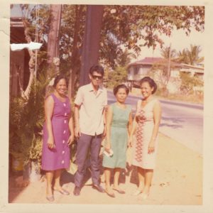 A man and three women on a Philippines street