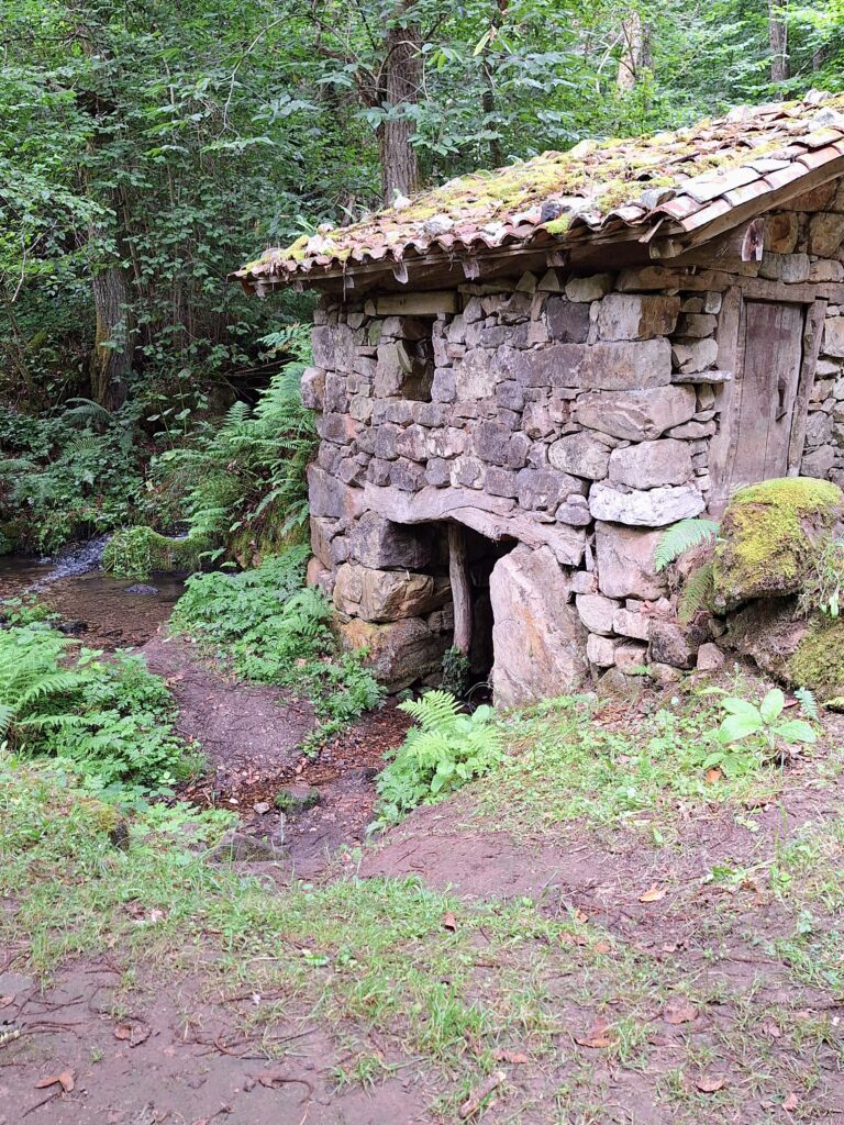 An old stone mill in Asturias , Spain