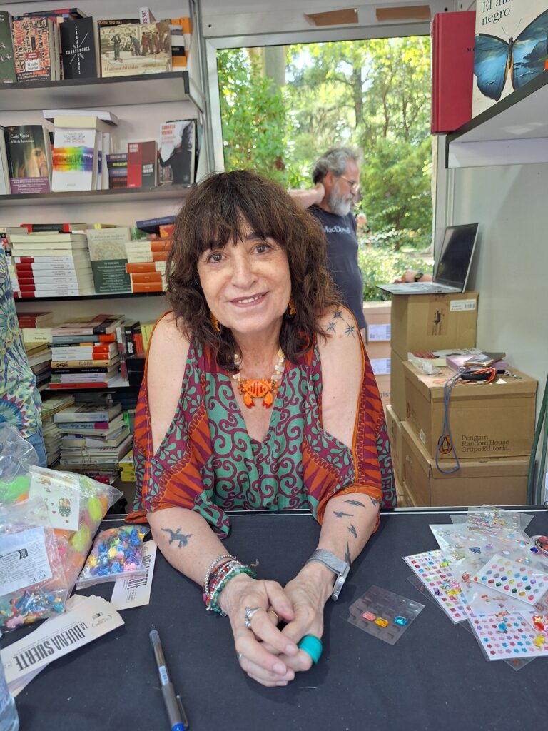 Spanish writer Rosa Montero at the signing desk in one of the book stalls at the book fair in Madrid