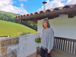 Woman on the terrace of a house in the Spanish Basque region.