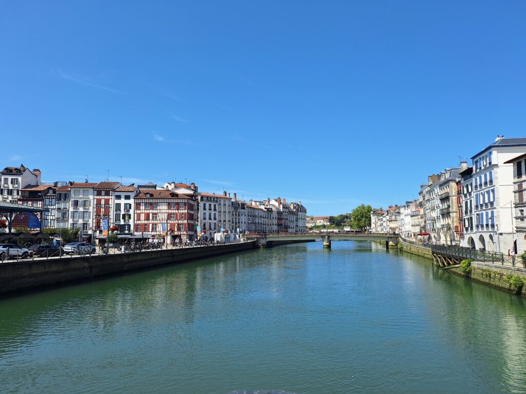 River in Bayonne, France with centuries-old buildings on either side