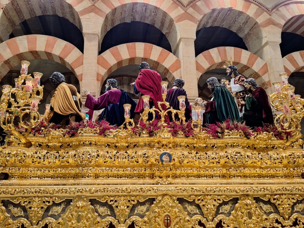 Catholic throne against the backdrop of the Islamic arches in the Great Mosque of Cordoba, Spain