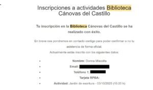 A notice of acceptance to a creative writing workshop at a library in Malaga, Spain